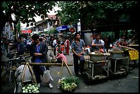 Street food vendors in an old alley. Kunming, Yunnan, China ( color)