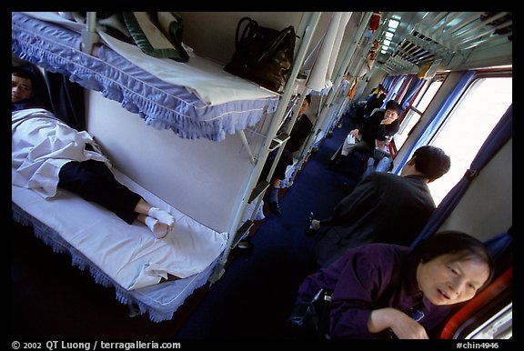 Inside a hard sleeper car train.  (color)