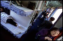 Inside a hard sleeper car train. (color)