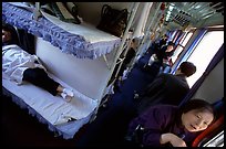 Inside a hard sleeper car train.