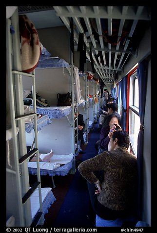 Inside a hard sleeper car train.  (color)