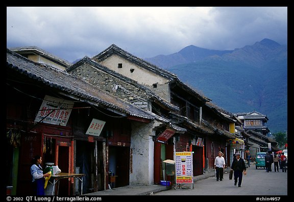 Old houses and Cang Shan mountains. Dali, Yunnan, China