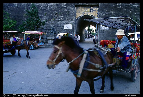 Horse carriage near the North Gate. Dali, Yunnan, China (color)