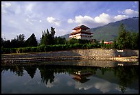 Chong-sheng Si, temple behind the Three Pagodas, reflected in a pond. Dali, Yunnan, China (color)