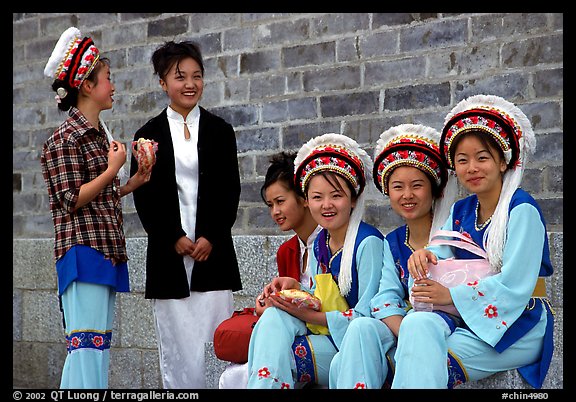 Women wearing traditional Bai dress. Dali, Yunnan, China (color)