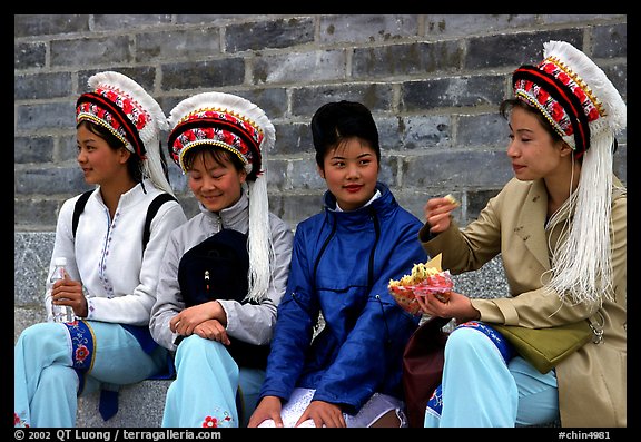 Women wearing traditional Bai dress. Dali, Yunnan, China (color)
