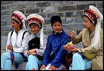 Women wearing traditional Bai dress. Dali, Yunnan, China