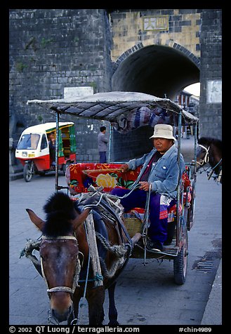 Horse carriage next to the North gate. Dali, Yunnan, China (color)