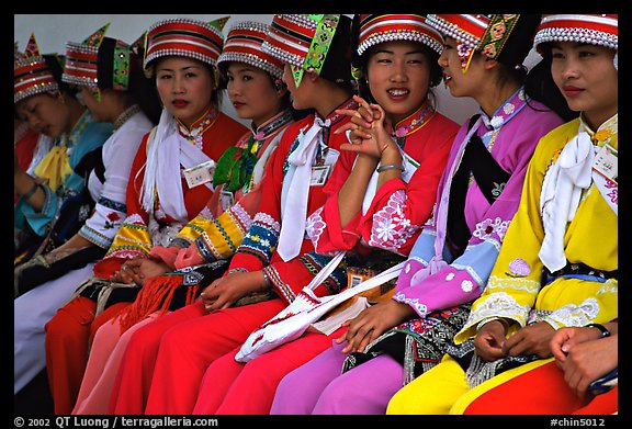 Tour guides dressed with traditional Sani outfits. Shilin, Yunnan, China