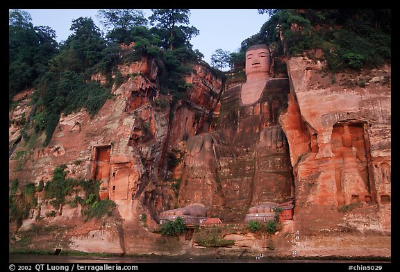 Da Fo (Grand Buddha) and two guardians seen from the river. Leshan, Sichuan, China