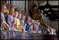 Some of the 1000 individually unique Terracotta arhat monks in Luohan Hall. Leshan, Sichuan, China (color)