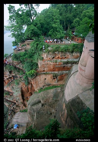 Da Fo (Grand Buddha) with staircase in cliffside and river in the background. Leshan, Sichuan, China