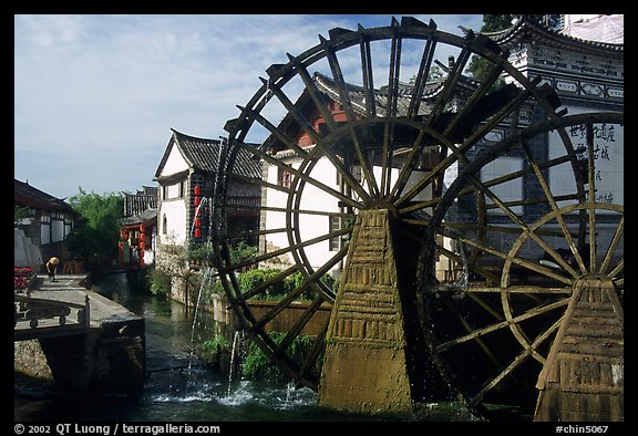 Big water wheel at the entrance of the Old Town. Lijiang, Yunnan, China