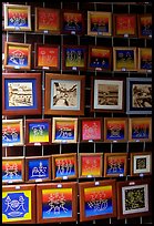 Decorated Dongba script for sale. The Naxi created 1000 years ago the only hieroglyphic language still in use. Lijiang, Yunnan, China