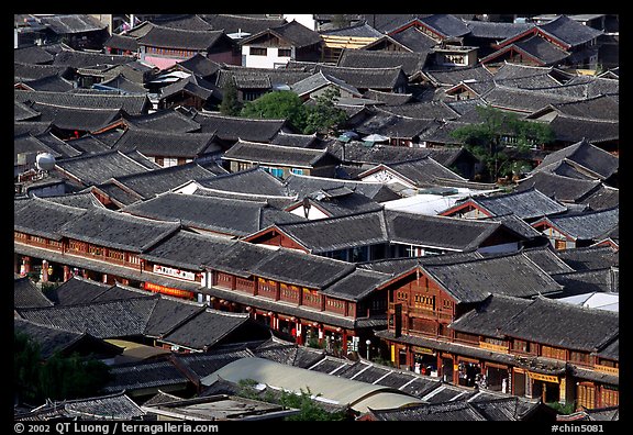 Rooftops of the old town seen from Wangu tower. Lijiang, Yunnan, China (color)