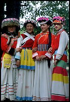 Women wearing Naxi dress. Lijiang, Yunnan, China (color)