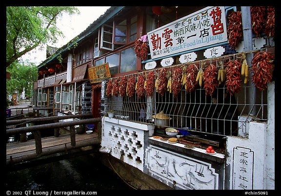 Snack Food in Lijiang restaurant overlooking a canal. Lijiang, Yunnan, China