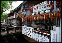 Snack Food in Lijiang restaurant overlooking a canal. Lijiang, Yunnan, China