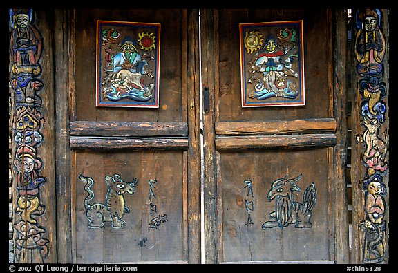 Decorated doors of a temple. Lijiang, Yunnan, China