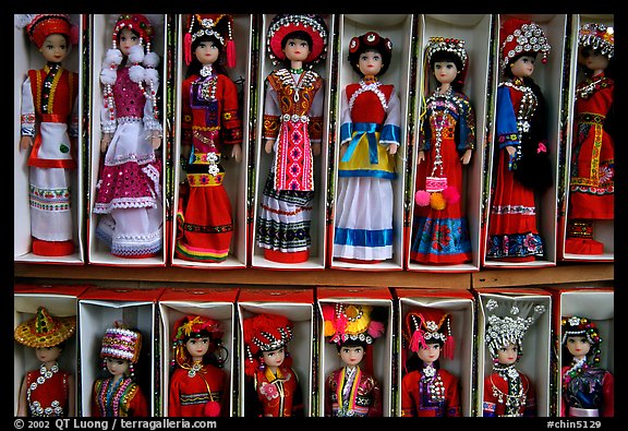 Dolls wearing traditional Bai dress. Lijiang, Yunnan, China (color)
