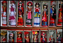 Dolls wearing traditional Bai dress. Lijiang, Yunnan, China (color)