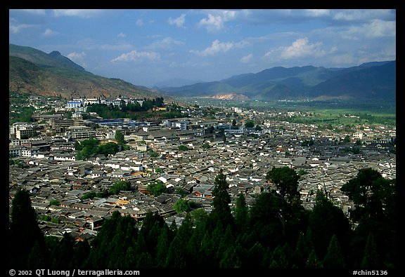 Old town, new town, and surrounding fields seen from Wangu tower. Lijiang, Yunnan, China (color)