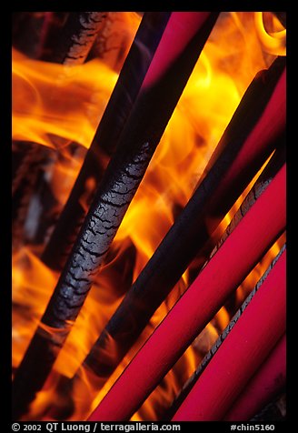 Incense batons being burned. Emei Shan, Sichuan, China (color)