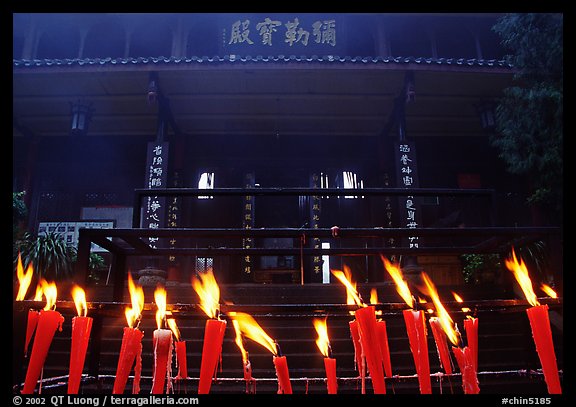 Candles burning in front of Wannian Si temple. Emei Shan, Sichuan, China (color)
