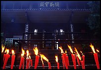 Candles burning in front of Wannian Si temple. Emei Shan, Sichuan, China (color)