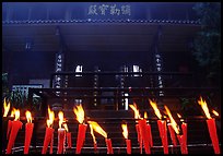 Candles burning in front of Wannian Si temple. Emei Shan, Sichuan, China ( color)