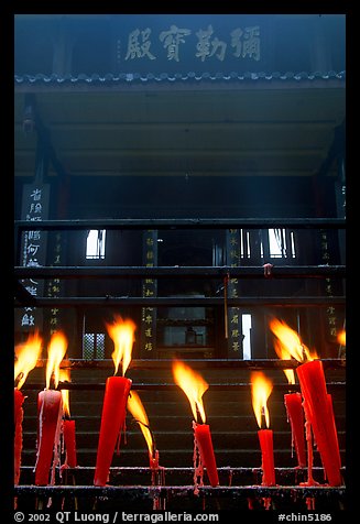 Candles burning in front of Wannian Si temple. Emei Shan, Sichuan, China