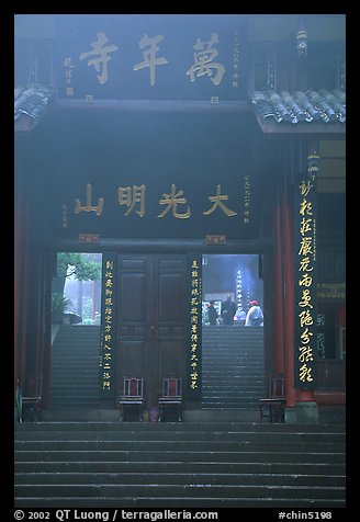 Doorway entrance of Wannian Si in the fog. Emei Shan, Sichuan, China