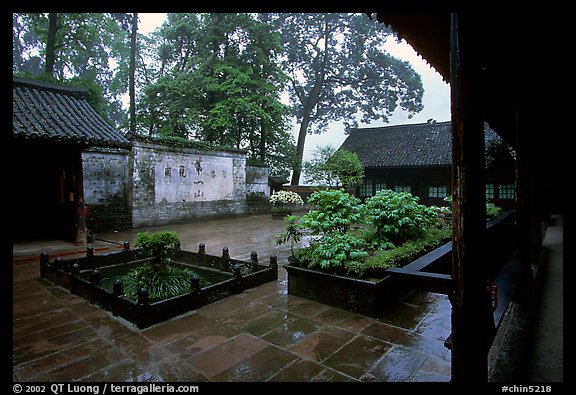 Courtyard of Hongchunping temple in the rain. Emei Shan, Sichuan, China (color)