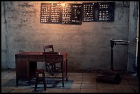 Desk with counting frame, blackboard with Chinese script, scale. Emei Shan, Sichuan, China (color)