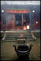 Urn in courtyard inside Xixiangchi temple. Emei Shan, Sichuan, China (color)