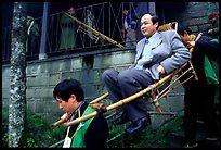 Wealthy pilgrim carried down Jieyin Palace on a chair. Emei Shan, Sichuan, China ( color)