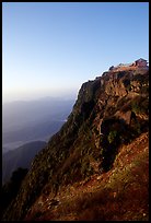 Sunrise on Jinding Si (Golden Summit), perched on a steep cliff. Emei Shan, Sichuan, China