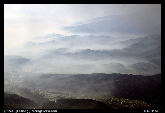 Receding ridges in fog, seen from Jinding Si, morning. Emei Shan, Sichuan, China
