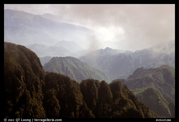 Forest-covered slopes and ridges of Emei Shan. Emei Shan, Sichuan, China (color)