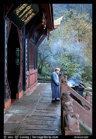 Monk in front of Jieyin Palace. Emei Shan, Sichuan, China (color)