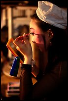 Sichuan opera actress applies makup. Chengdu, Sichuan, China ( color)