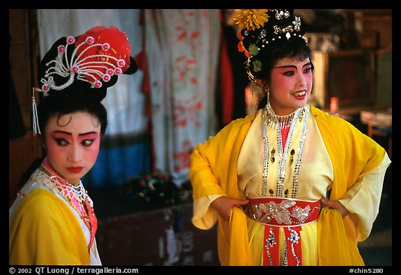 Two characters of Sichua opera off stage. Chengdu, Sichuan, China (color)