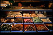 Food stall by night. Sichuan food is among China's spiciest. Chengdu, Sichuan, China (color)