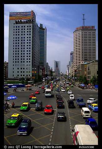 Car traffic on a major avenue. Chengdu, Sichuan, China (color)