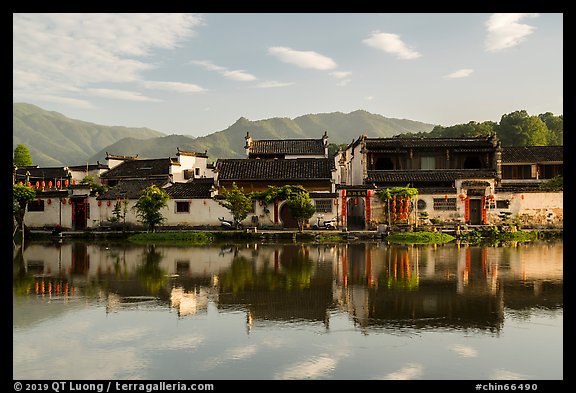 Village reflected in Nanhu Lake, morning. Hongcun Village, Anhui, China (color)