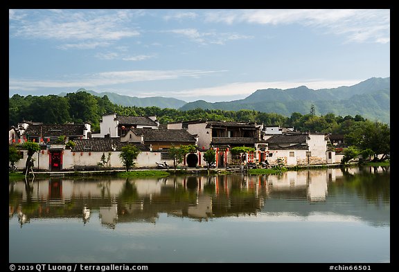 Village reflected in South Lake. Hongcun Village, Anhui, China (color)