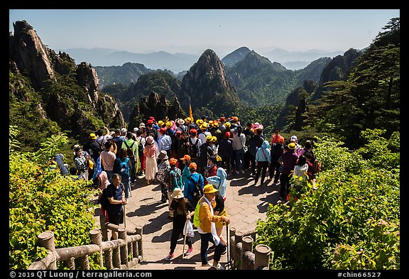 Tourists at overlook. Huangshan Mountain, China (color)