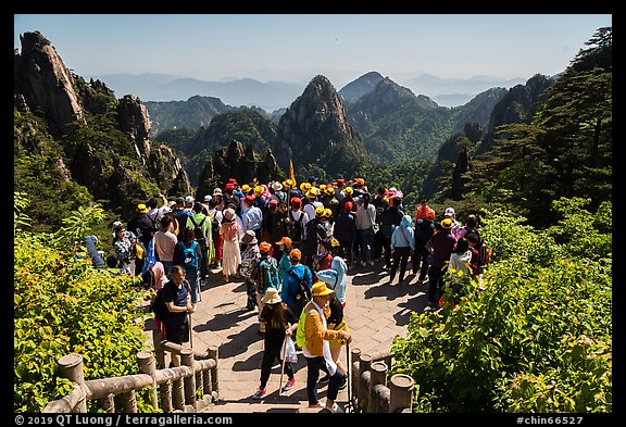 Tourists at overlook. Huangshan Mountain, China (color)