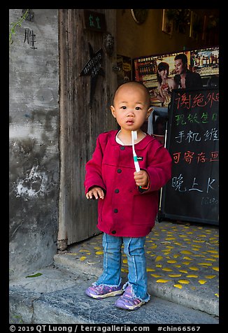 Boy with toothbrush. Xidi Village, Anhui, China (color)