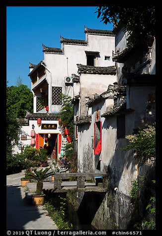 Village street with stream. Xidi Village, Anhui, China